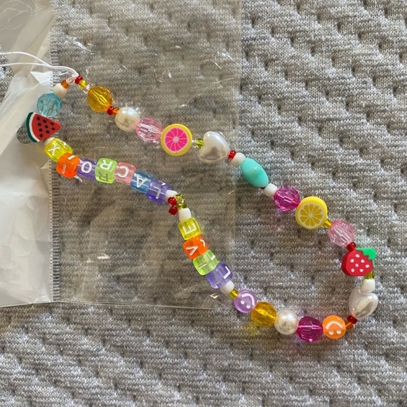 LACROIX PHONE CHARM NEW - Picture 2 of 2